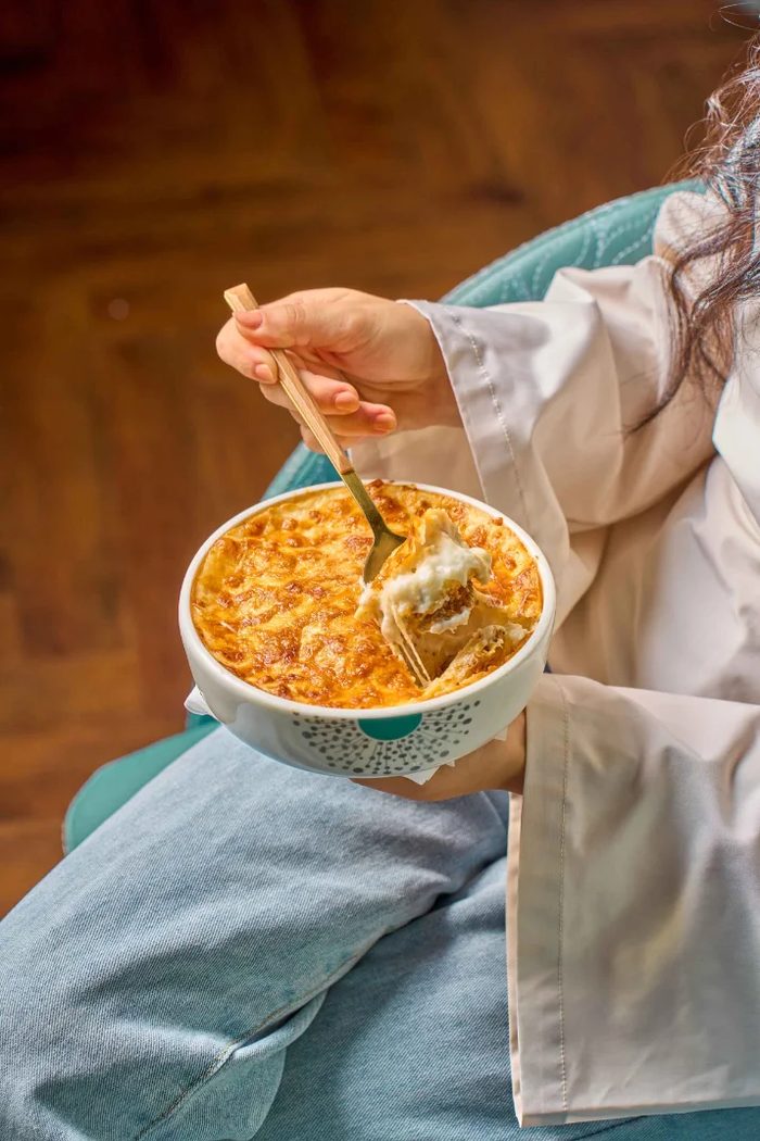 Team member enjoying a Prepd lunch bowl