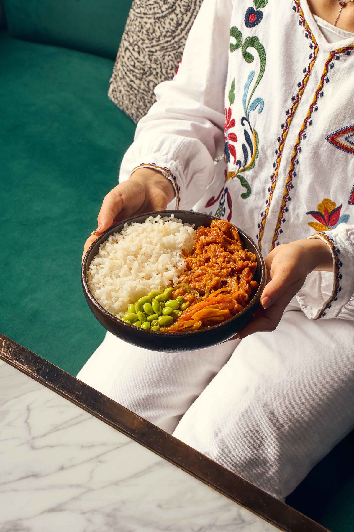 Korean chicken bowl with rice and edamame